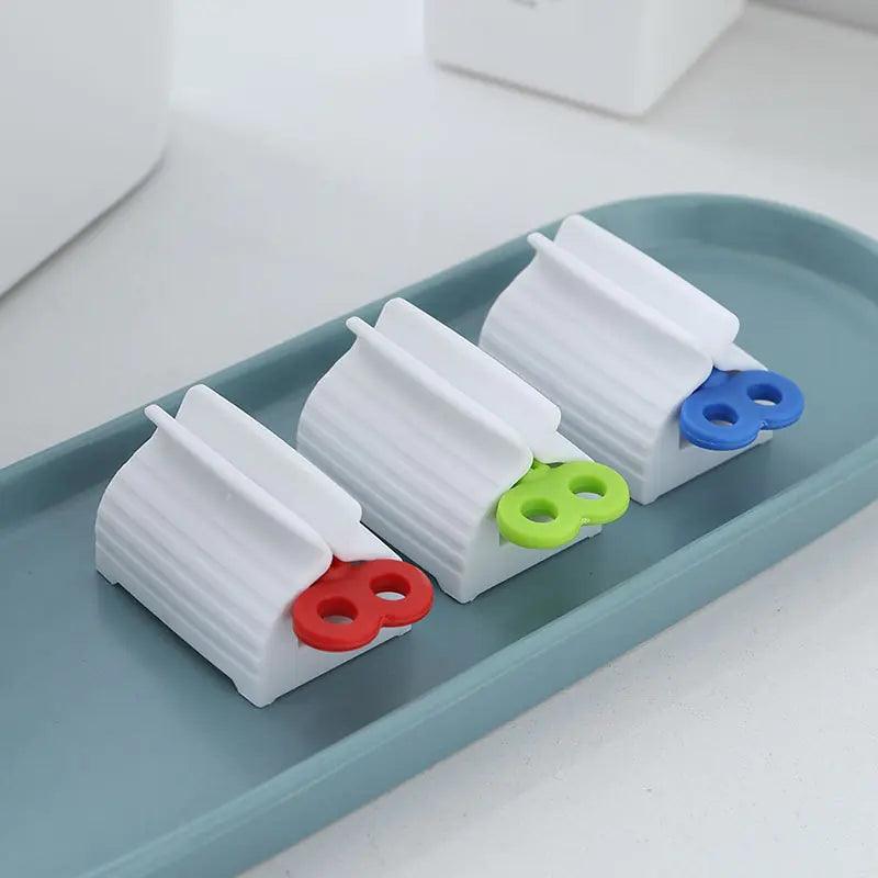 Toothpaste Squeezer Rolling Tube - Oral Agency